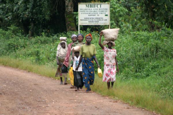 Image of Ugandan people walking alongside a road Uganda people Uganda