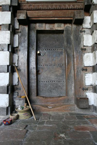 Picture of Yemrehanna Kristos church (Ethiopia): Wooden entrance to Yemrehanna Kristos church