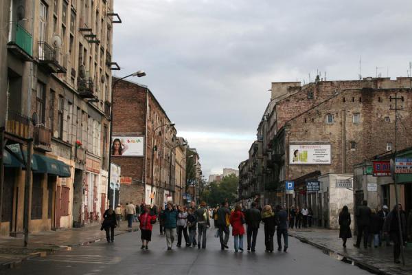 Image of Poles walking in a street of the Praga district Warsaw Poland