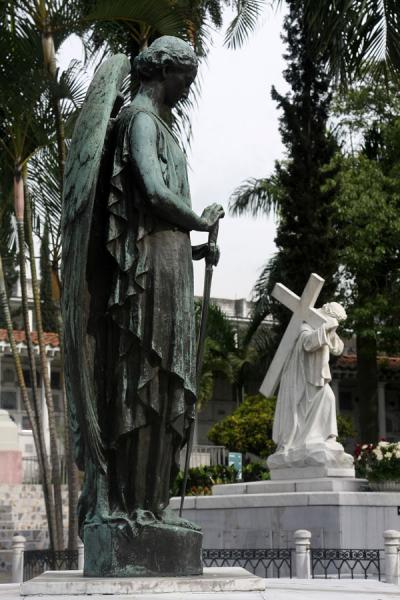 Image of Statues decorate many family tombs at San Pedro cemetery Medell n 