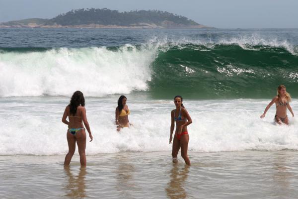 Image of Ipanema beach Rio de Janeiro girls waiting for a wave Rio