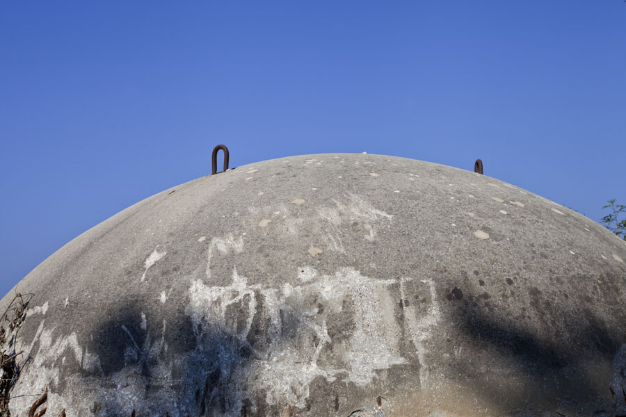Picture of Borsh bunkers (Albania): Concrete bunker with metal hooks facilitating placing the beast in its proper place