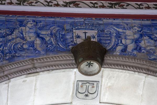 Foto van Detail of the ceiling of the Igreja da Nossa Senhora do Carmo with tiles and crown - Angola - Afrika