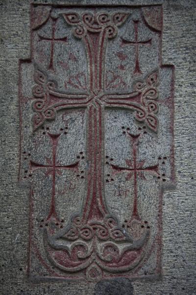 Picture of Crosses in different sizes carved out in a wall of the Haghpat Monastery complex
