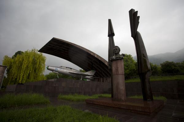 Picture of Mikoyan museum (Armenia): Statue in memory of Artyom Mikoyan with MiG fighter jet in the background
