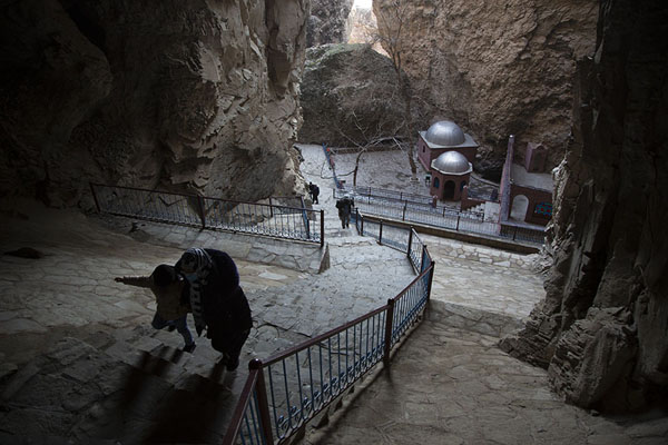 Looking down from a higher cave with stairs and mosque in the background | Ashabi Kahf | Azerbaijan