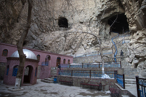 Picture of Mosque to the left and stairs to one of the higher caves of Ashabi Kahf - Azerbaijan - Asia
