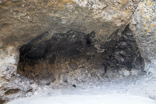 Remains of smoke on the rock wall of one of the open caves | Ashabi Kahf | Azerbaijan