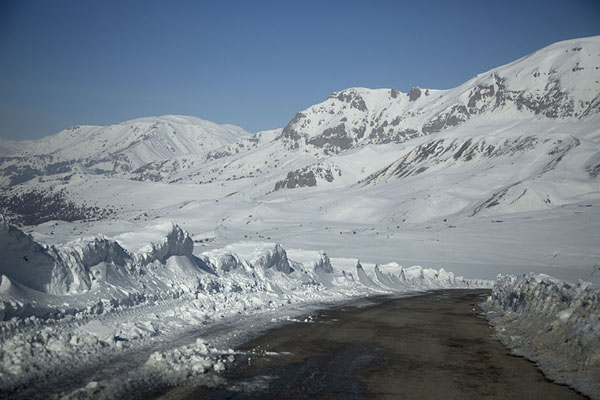 Picture of Cleared road cutting through the winter landscape above Lake Batabat - Azerbaijan - Asia