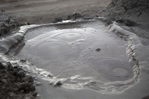 Crater filled with mud at one of the many volcanoes of Gobustan | Gobustan mud volcanoes | Azerbaijan