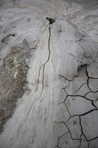 Picture of Trickle of mud coming out of one of the many mud volcanoes
