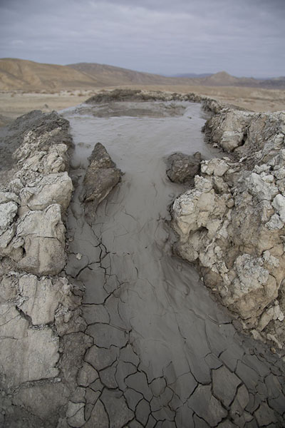 Picture of Gobustan mud volcanoes (Azerbaijan): Mud streaming out of one of the craters of the mud volcanoes