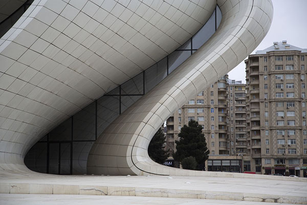 Part of the Heydar Aliyev Centre with apartment blocks in the background | Heydar Aliyev Centre | Azerbaijan