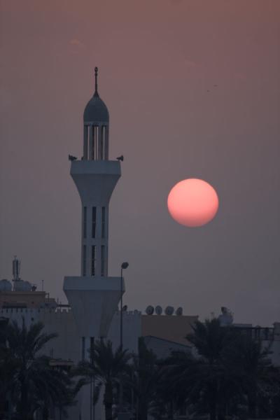 Picture of Sunset over Manama seen from near Qalat AradMuharraq - Bahrain