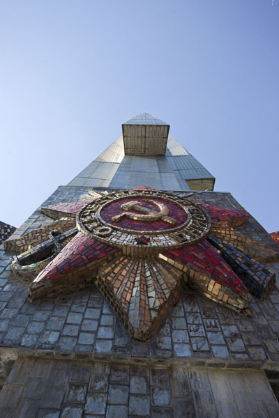 The Soviet emblem at the base of the four bayonets | Mount of Glory | Belarus