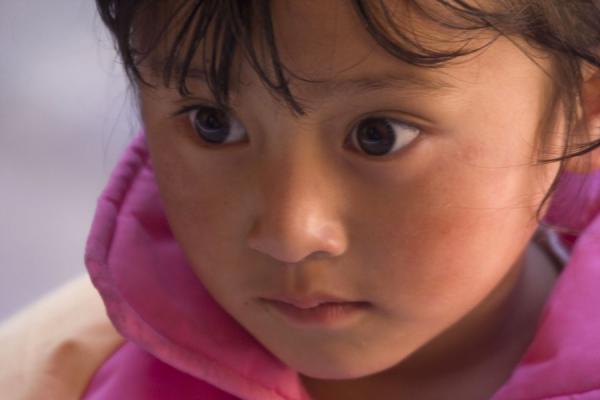 Picture of Small girl at a tsechuBhutan - Bhutan