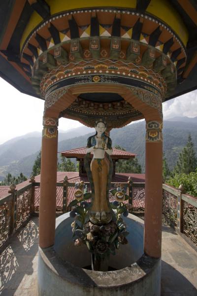 Statue in a small pavilion | Khamsum Yuelley Namgyal Chorten | Bhutan