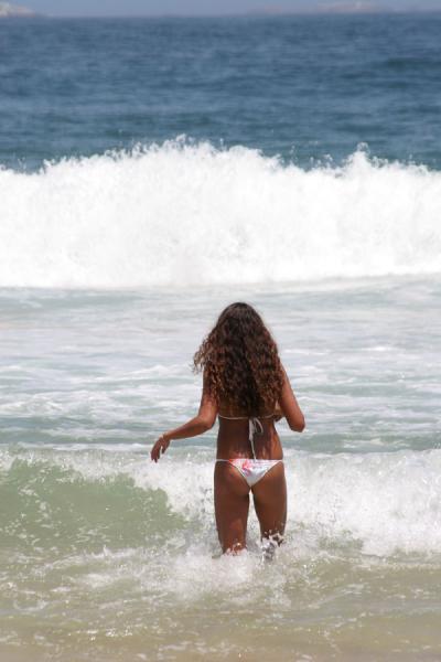 Girl about to enter the water in Rio de Janeiro | Rio beach girls | Brazil