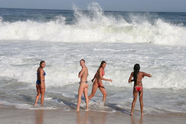 Picture of Rio beach girls (Brazil): Copacabana girls in the sea, playing with the big waves