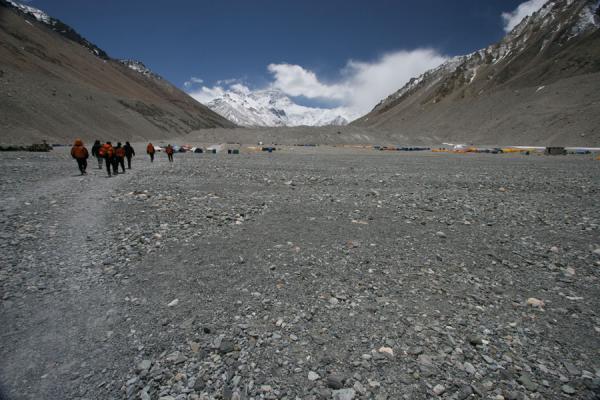 Picture of Mount Everest North Face (China): Mountaineers entering Everest Base Camp with Mount Everest in the background