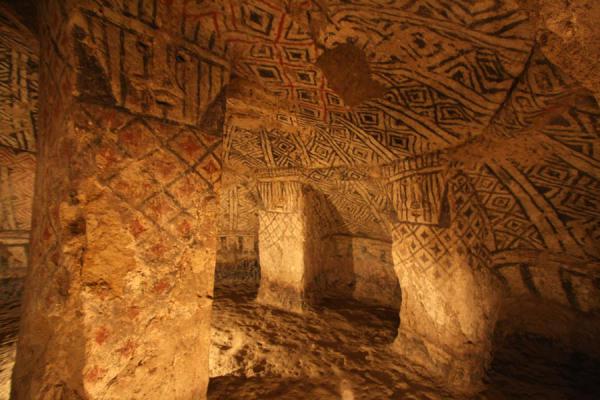 Picture of Alto de Segovia tombs (Colombia): Looking inside a tomb of Alto de Segovia with mural paintings