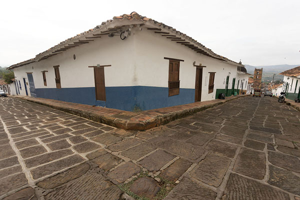 Corner of a cobblestone street in Barichara with colonial houses | Barichara | Colombia