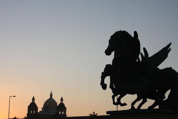 Monumento a los Pegasos with the cupola of San Pedro in the background | Cartagena de Indias | Colombia