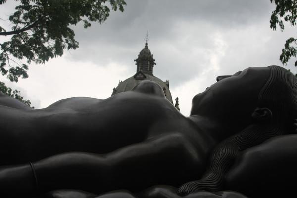 Picture of Plaza Botero (Colombia): Looking up at a woman lying on Plaza Botero