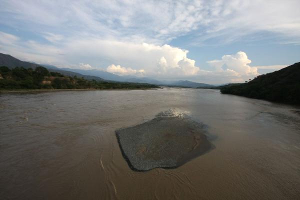 Cauca river seen from the Puente de Occidente suspension bridge | Puente de Occidente | Colombia