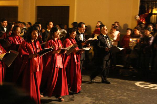 Picture of Semana Santa Popayán (Colombia): Choir dressed in red as part of the Semana Santa procession