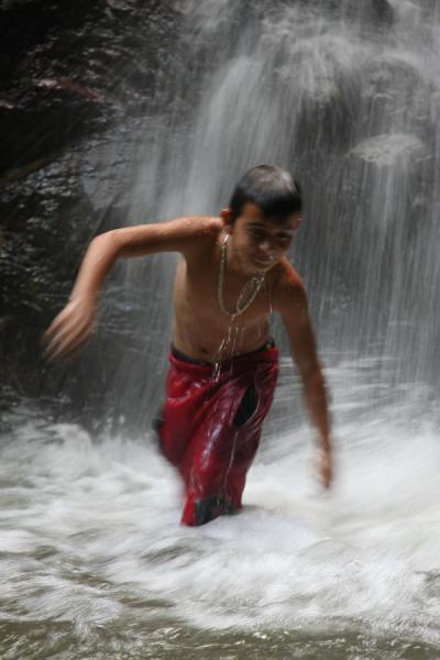 Colombian boy playing in Sucre Falls | Sucre Falls | Colombia