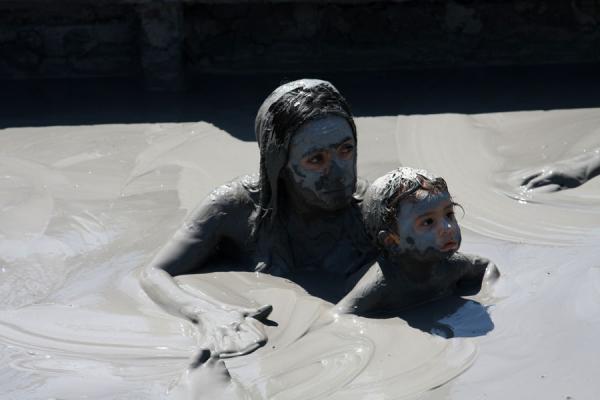 Picture of Totumo Volcano (Colombia): Woman with child having a dip in the mud volcano of Totumo