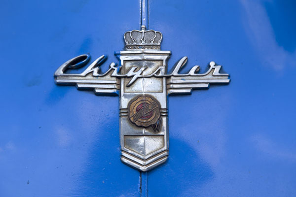 Detail of the logo of a vintage Chrysler car in Havana | Havana classic cars | Cuba