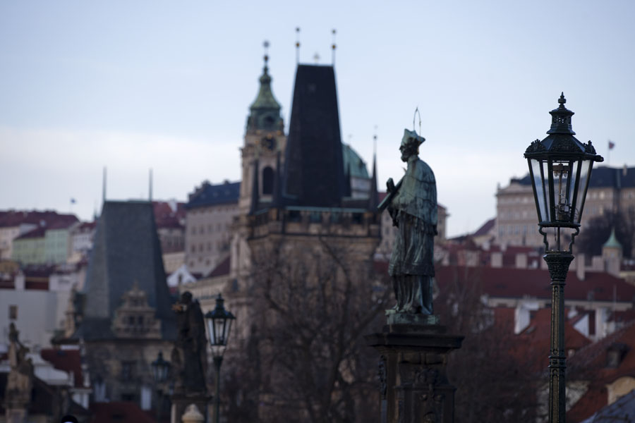 Towers with spires, lanterns, and statues at the western side of Charles Bridge | Pont Charles | Républiquie Tchèquie