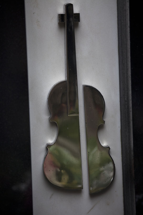 Picture of Reflective violin at a tomb of Vyšehrad cemeteryPrague - Czechia