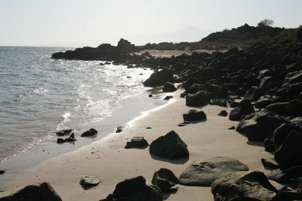 Picture of Sable Blanc (Djibouti): Rocks at the end of the main beach of Sable blanc