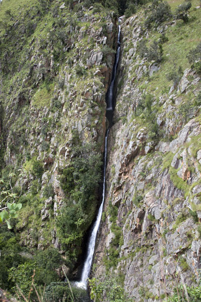 Thin and tall Majolomba Falls cutting through the rocks | Malolotja National Park | Eswatini