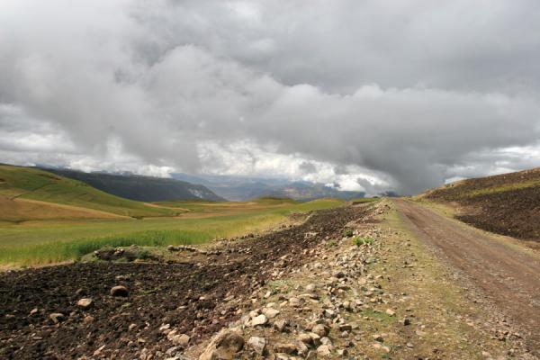 Picture of Dark clouds looming over the road from Chennek to Sankabar