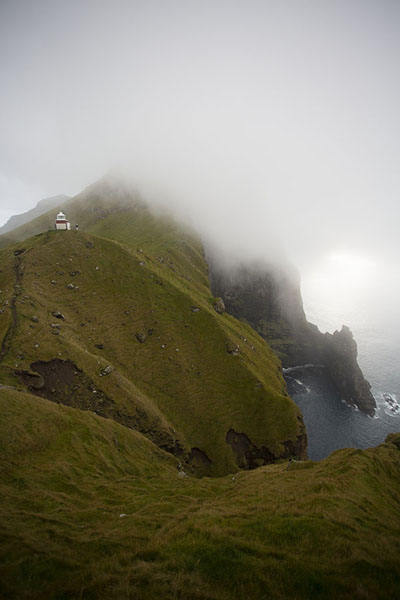 Foto van Clouds enveloping the northern cape of Kalsoy islandKalsoy - 
