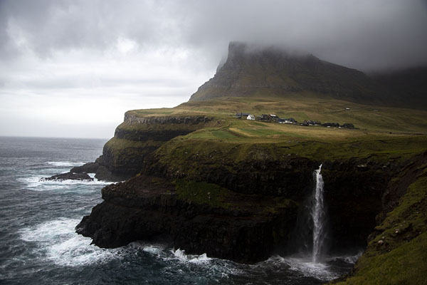Picture of Múlafossur (Faroe Islands): Múlafossur waterfall with rugged coastline near Gásadalur