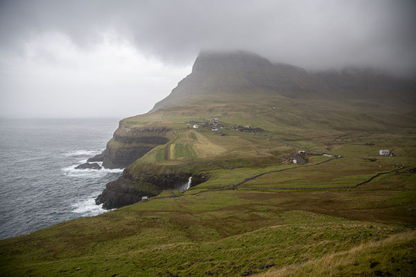 Picture of Múlafossur (Faroe Islands): The landscape near Gásadalur with the top of Múlafossur waterfall just visible