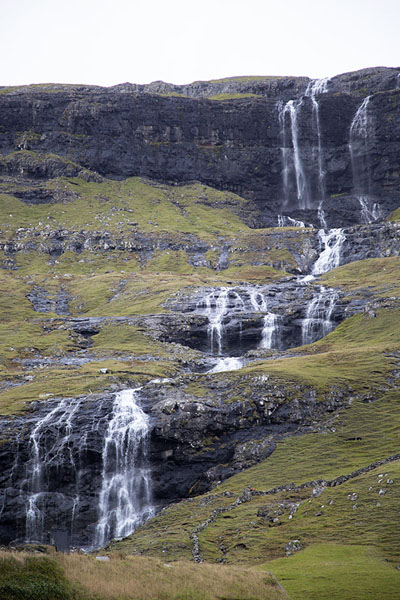 One of the bigger waterfalls coming down the mountain above Tjørnuvik | Saksun Tjørnuvik Hike | 