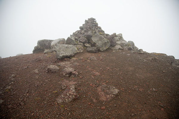 Picture of The summit of Villingadalsfjall is littered with cairns