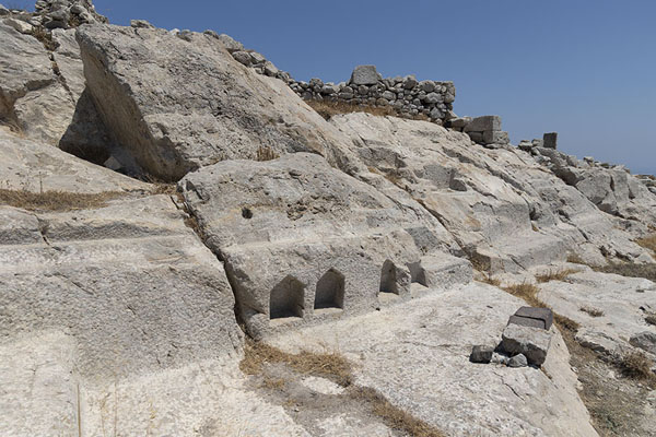 Remains of a sanctuary for Egyptian gods carved out in the rocks of Ancient Thera | Ancient Thera | Greece