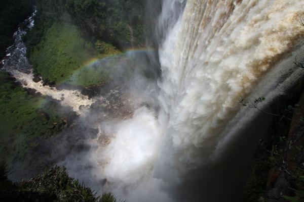 Potaro river thundering into the rainbow below | Cascades de Kaieteur | Guyana