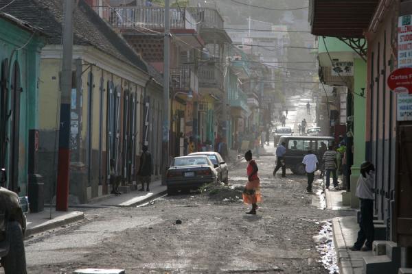 Picture of Cap Haïtien streetlife (Haiti): Crossing a street in Cap Haïtien in the late afternoon
