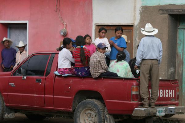 Picture of Belén Gualcho: getting into a pickup to go home