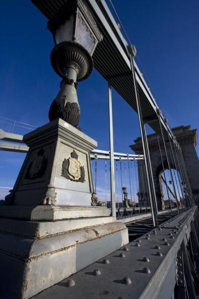 Picture of Lantern and cable leading up to one of the stone pillars of Széchenyi chain bridgeBudapest - Hungary