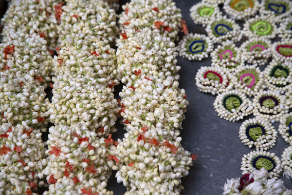 Picture of Krishnarajendra Market (India): String of flowers on display at a KR market stall