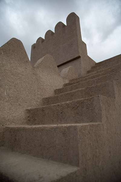 Looking up the stairs of a restored tower of the citadel of Bam | Bam citadel | Iran